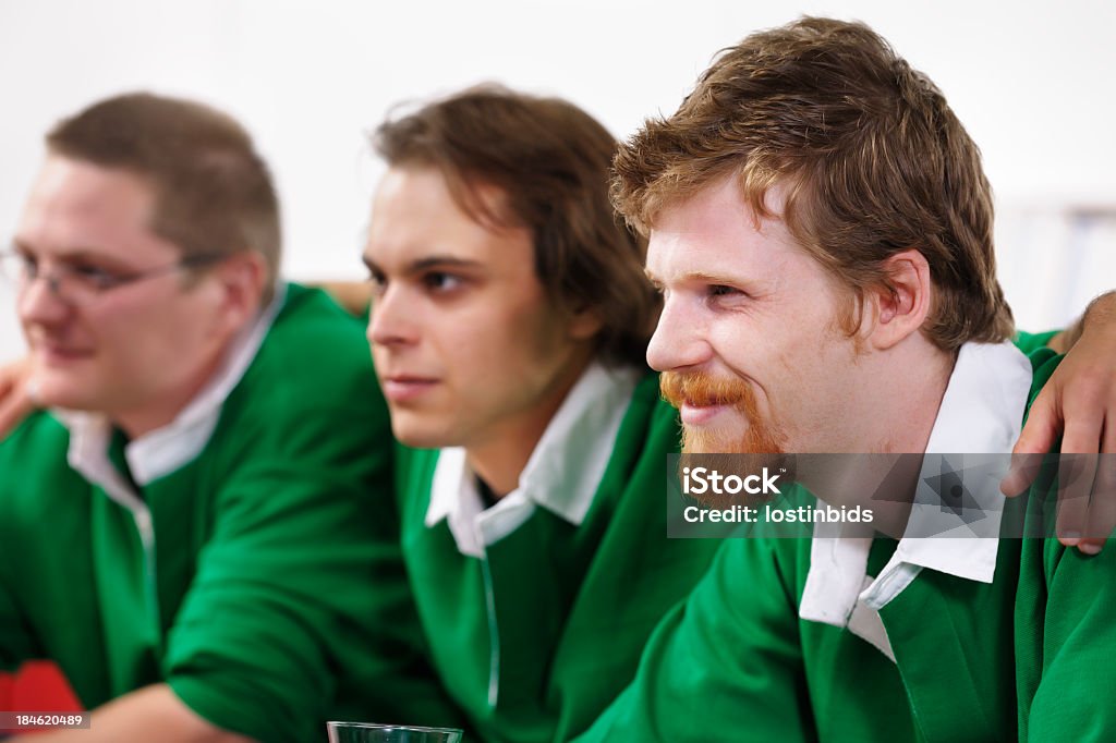 Group Of Rugby Fans/ Supporter Enjoying A Match A portrait of a group of rugby fans enjoying a match. Rugby - Sport Stock Photo