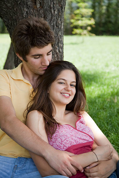 istock Attractive young couple in the park 184620504