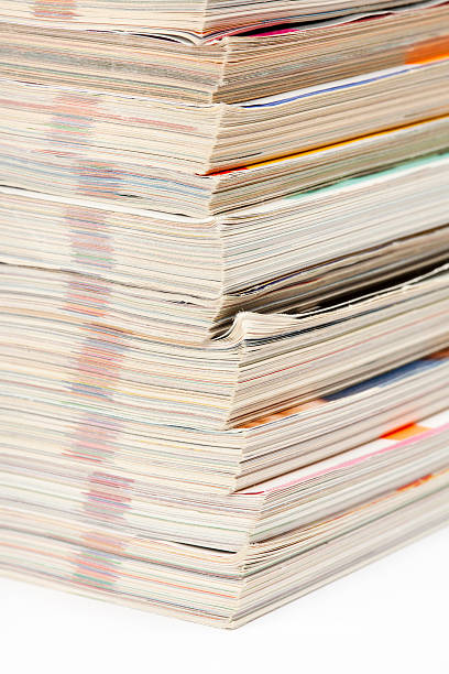 istock Lower part of magazines pile 184621142
