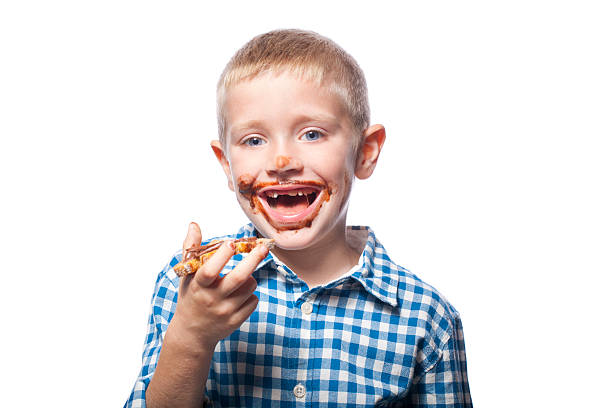 istock Portrait of a child with chocolate bread 184621550