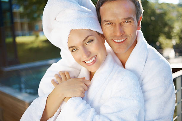 istock Happy couple at spa center 184621609
