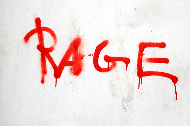 istock The word Rage spray  painted onto dirty white wall 184622019