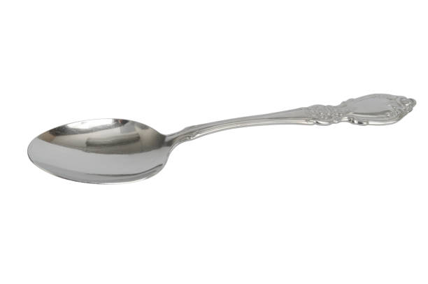 Silver Spoon A silver spoon with a clipping path included baby spoon stock pictures, royalty-free photos & images