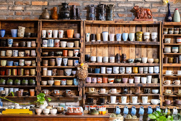 istock Small store with many pottery ceramic standing on shelves. 1846221592