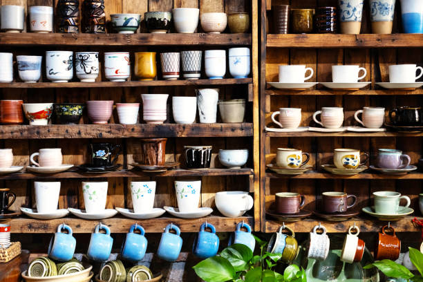 istock Small store with many pottery ceramic standing on shelves. 1846221707