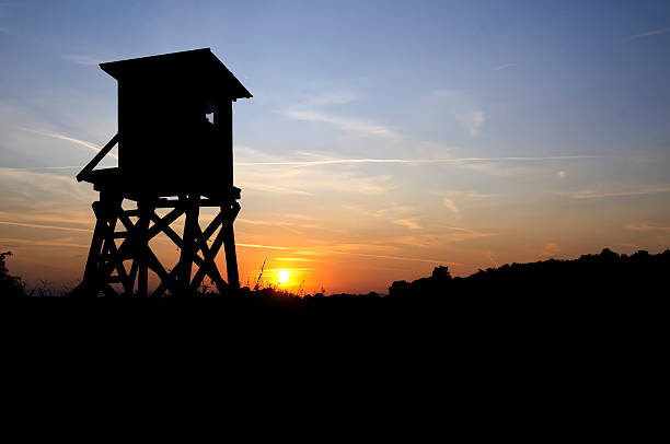 Scenic with silhouette of hunters blind