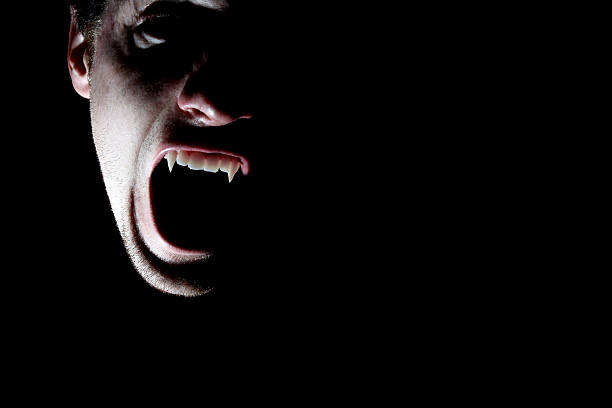 Vampire Vampire coming forward from the shadows vampire photos stock pictures, royalty-free photos & images
