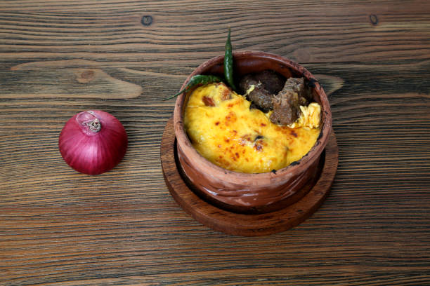 istock Halla kebab and cheese with onion and green chilli served in clay dish isolated on table side view of arabic food 1846230951