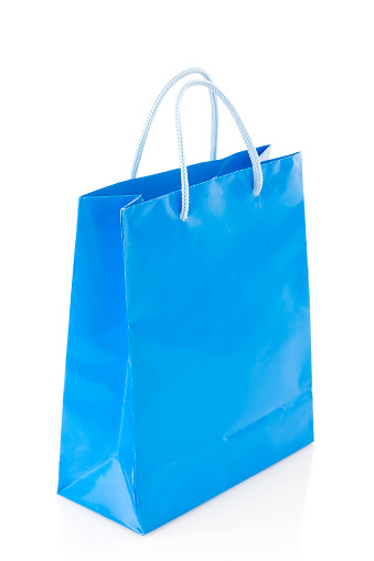 Blue gift bag isolated on white background