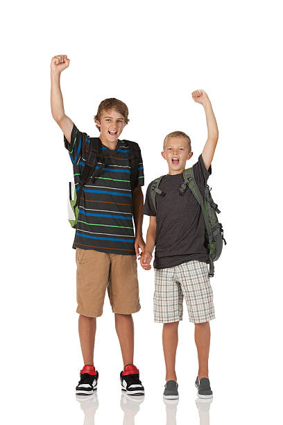 istock Portrait of two boys cheering 184623754