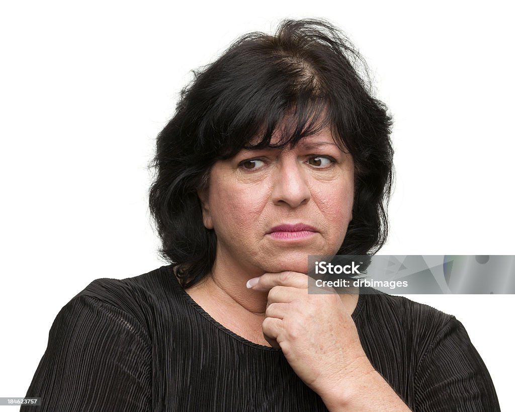 Nervous Woman Looks Away Portrait of a woman on a white background. Women Stock Photo