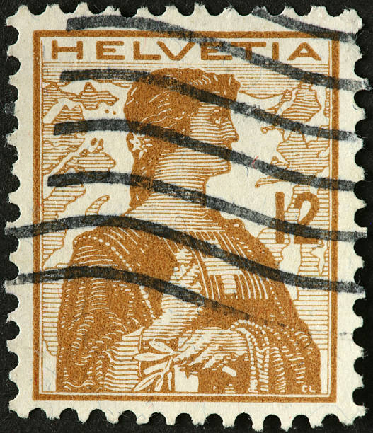 istock woman with sword on old Swiss postage stamp 184623868