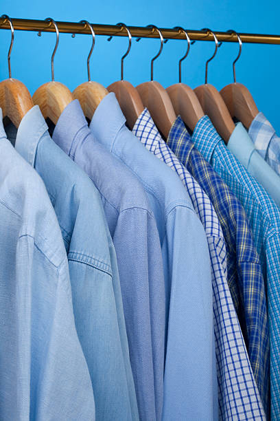 istock Mens Blue Shirts On A Rail 184623980