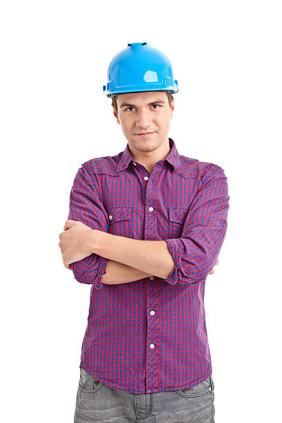 istock young handsome man with blue helmet 184623991