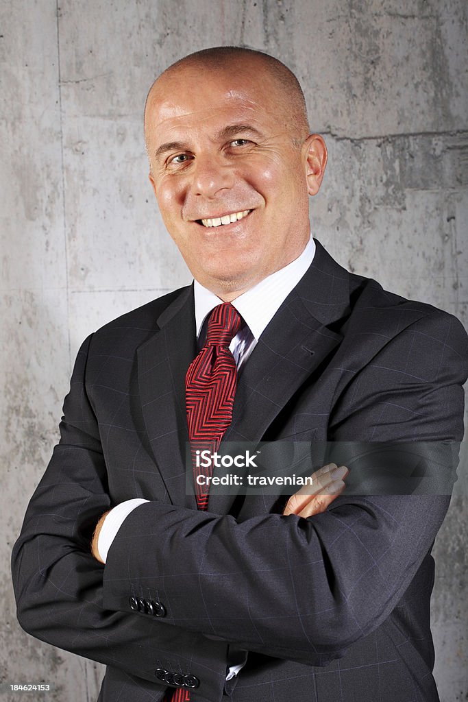 Ritratto di un uomo d'affari senior sorridente - Foto stock royalty-free di Businessman