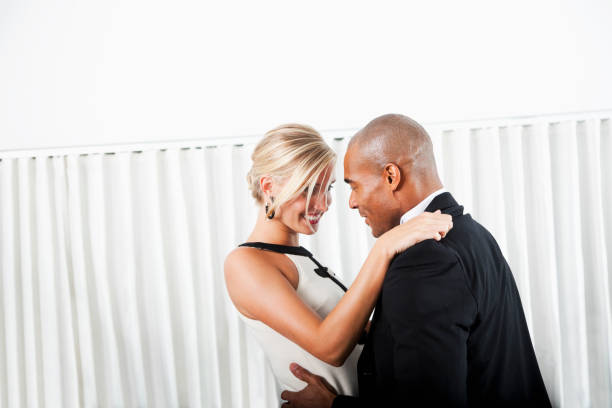 istock Interracial couple in formalwear 184624171