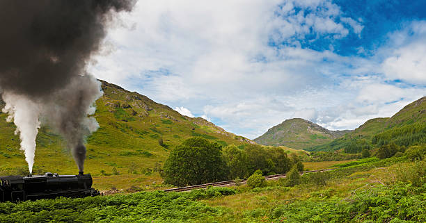istock Steam train rushing through Highland mountain glen Scotland 184624254