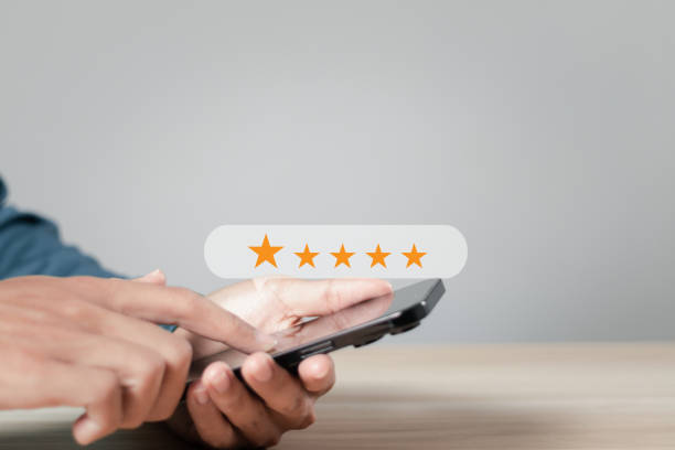 istock User take survey feedback online on application smartphone. Rate experience satisfaction for 5 stars, Best review and rating to review service. Customer satisfaction concept. 1846243933
