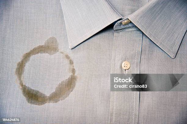 Foto de Manchas De Café Em Uma Camisa Limpas E Dobradas e mais fotos de stock de Vestuário - Vestuário, Manchado, Café - Bebida