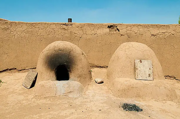 "Ovens for cooking pottery and bread in Taos Pueblo, New Mexico, USA."
