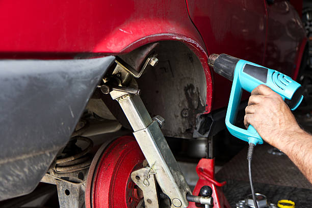 Auto mechanic working at repair shop