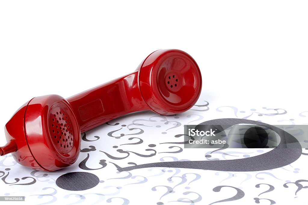 Unknown Numbers Red phone with question mark Telephone Stock Photo