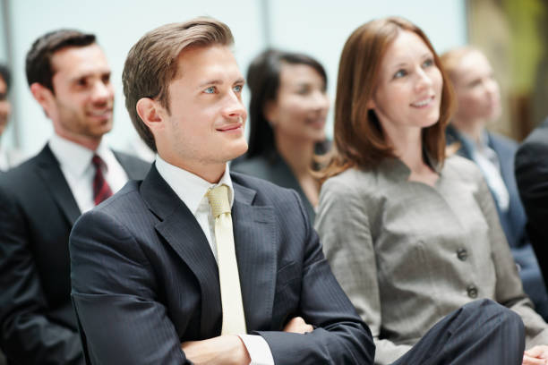 istock Business man attending conference with colleagues 184625893
