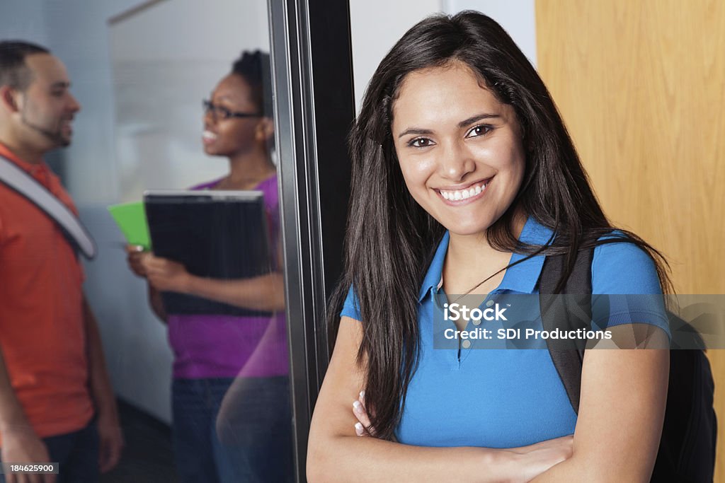 Happy College Student Outside Her Classroom Happy College Student Outside Her Classroom. Adult Stock Photo