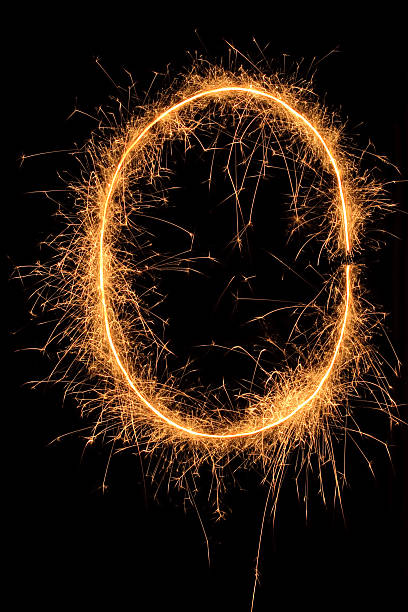 Sparkling Sign The alphabet made with sparklers. flaming o symbol stock pictures, royalty-free photos & images