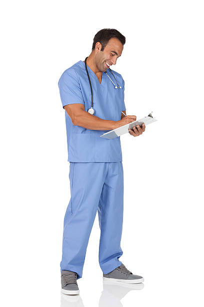 istock Male doctor writing on a clipboard 184626744