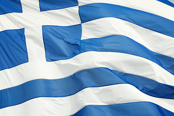 Greek Flag Waving Outdoors Full Frame Horizontal Close-Up stock photo