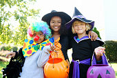 Halloween kids in costumes smiling