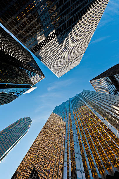 istock Soaring skyscrapers shining downtown blue sky 184627719