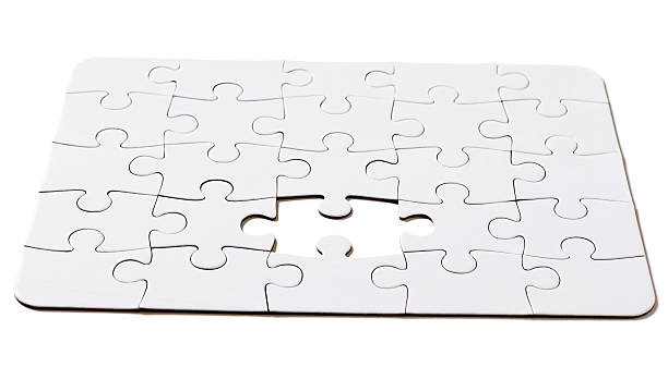 istock Frame-filling white jigsaw minus one piece. Isolated 184627759