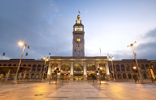 The San Francisco Ferry Building at sunrise.  The Ferry Building is located on the Embarcadero in the Financial District a short distance from the Bay Bridge.