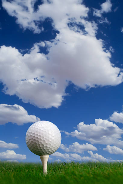 istock White Golf Ball on green grass 184627898