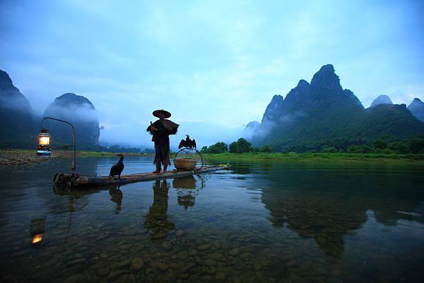 istock Lijiang fishermen 184628093