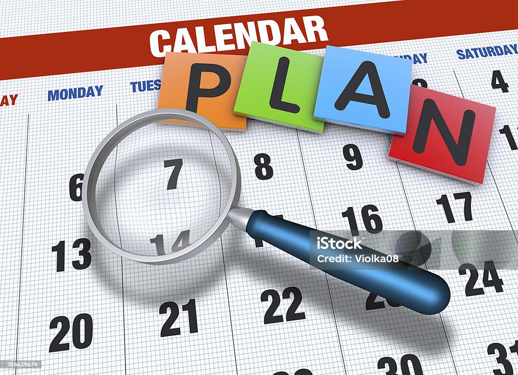 Calendario con la lente d'ingrandimento - Foto stock royalty-free di Agenda