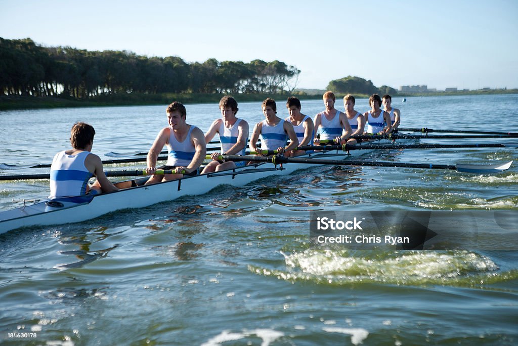 Crew Rowers Athletes Rowing A Crew Row Boat Stock Photo - Download Image Now ...