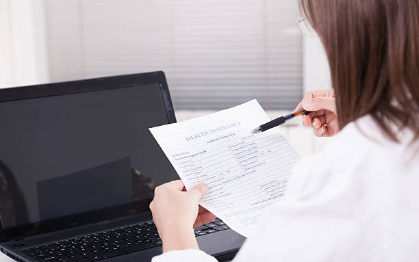 istock Female doctor working in office 184633300