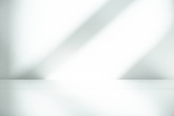 istock Wall interior background, studio  and backdrops show products.with shadow from window color white . background for text insertion and presentation product 1846338415