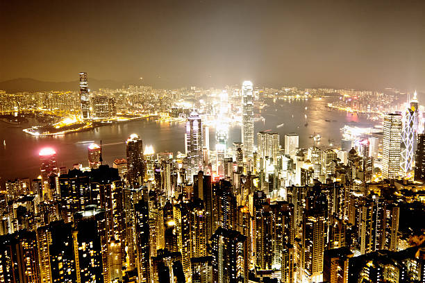 hong kong - city mega night built structure - fotografias e filmes do acervo