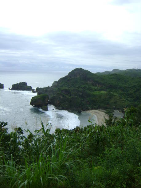 istock Yogyakarta Mountain rocks on the Pacific Ocean 1846359353
