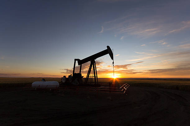 istock Oil Well Sunrise 184636443