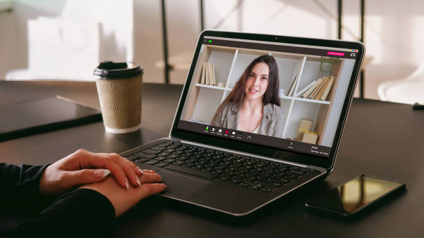 istock Video communication woman laptop hands home office 1846367700