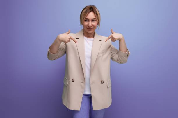 istock blonde 30s woman in jacket offers ideas with hands 1846367927