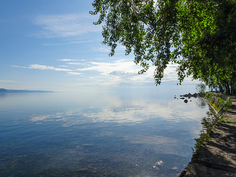 Shore of Lake Baikal, clean transparent water, summer day.
