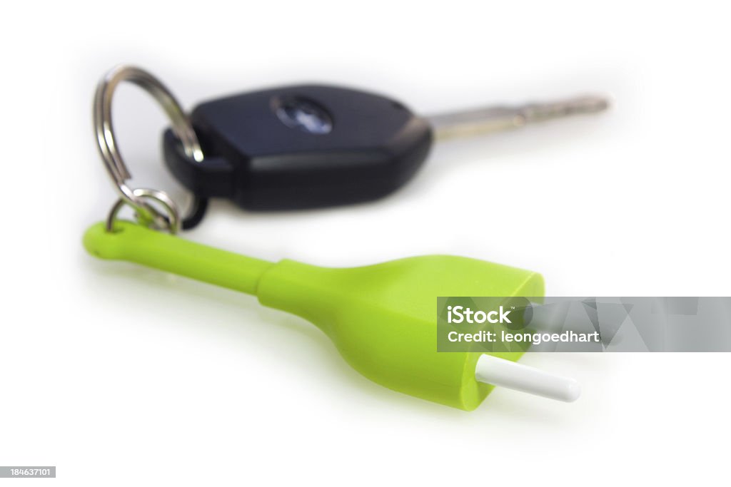 As chaves do carro elétrico e chaveiro plug - Foto de stock de Carro elétrico royalty-free