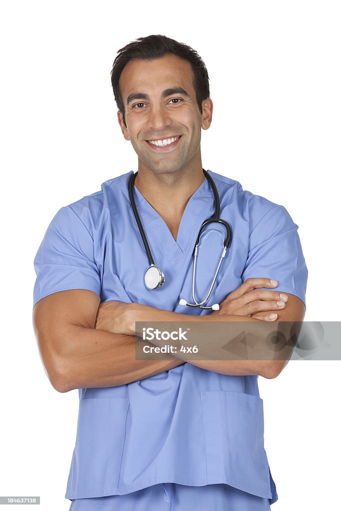 Male doctor standing with his arms crossed Male doctor standing with his arms crossedhttp://www.twodozendesign.info/i/1.png 20-29 Years Stock Photo