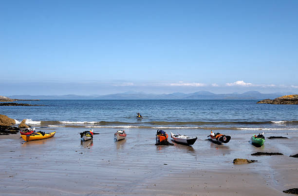 Kayaks on beach, Gulf of Corryvrecken stock photo